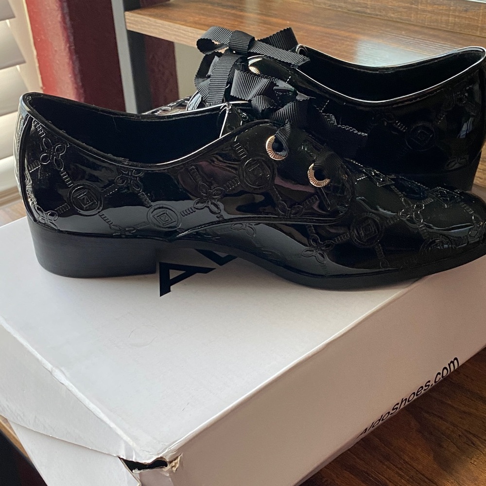 Aldo Black Patent Leather Moccasins